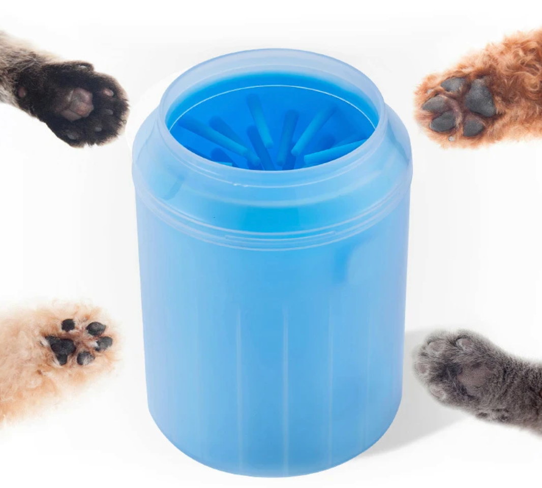 Blue paw cleaner cup surrounded by four dog paws