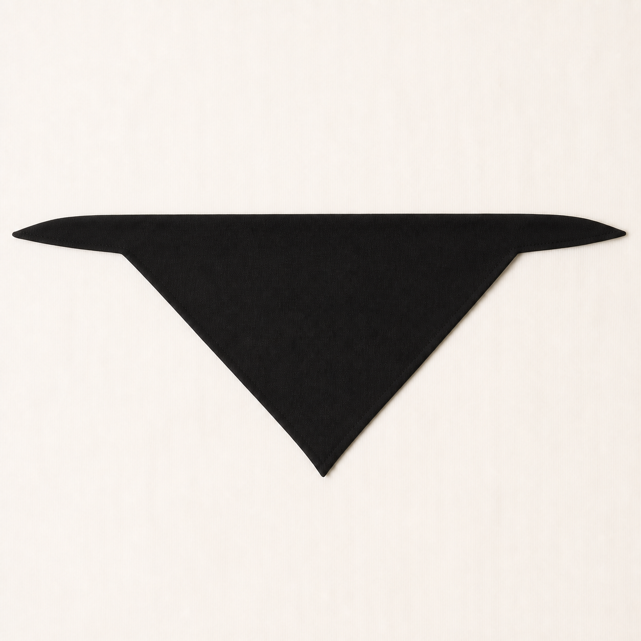 Illustrative design preview of a plain black tie-on dog bandana
